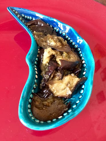 Egyptian spicy pickled eggplants with chili and garlic (betengam milkhalil).